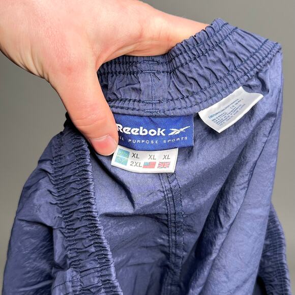 Vintage Reebok Track Pants Navy Blue Nylon Joggers White Embroidered Logo 90s - Picture 4 of 4
